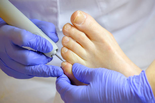 istock Pedicure specialist works with the patient 652345502