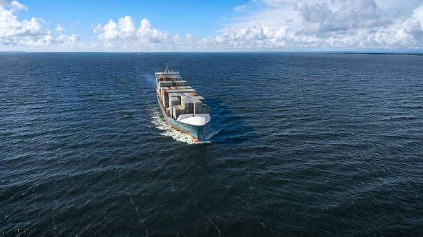 istock Aerial view of container ship sailing in the sea 652346014