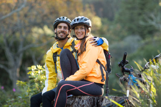 istock Biker couple sitting on a tree stump 652352776