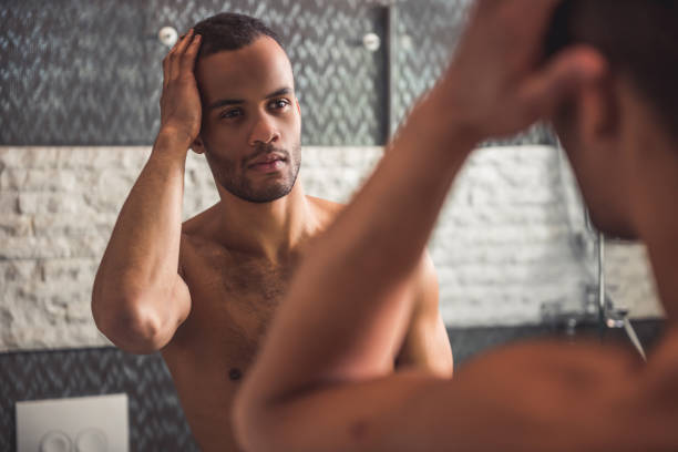 istock Afro American man in bathroom 652355884