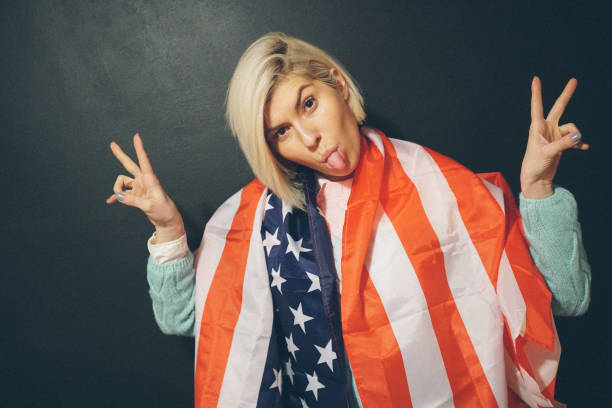 istock Blonde girl with USA flag 652356596