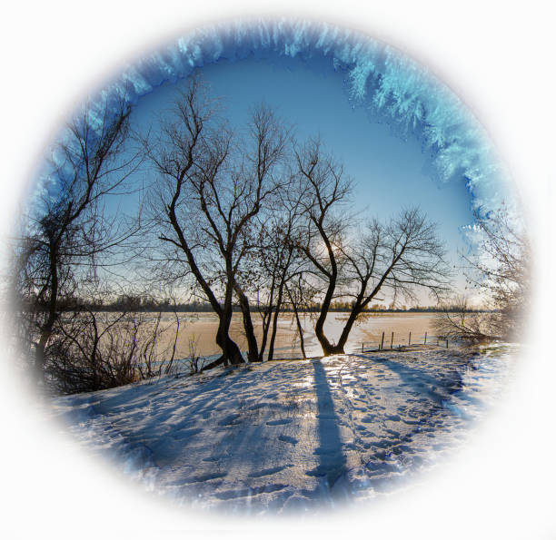 istock Noon on the frozen river in winter 652360270