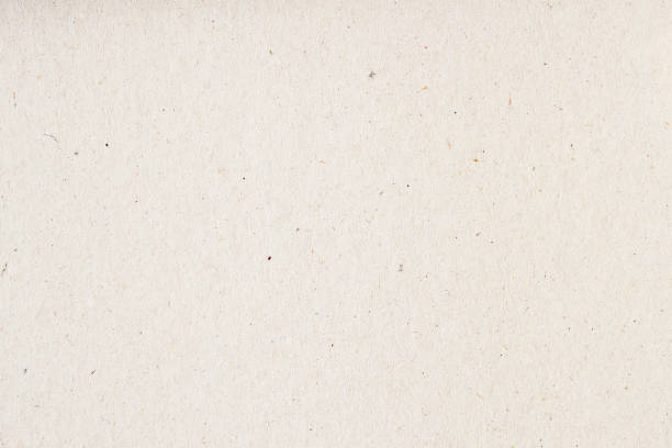 istock Texture of old organic light cream paper, background for design with copy space text or image. Recyclable material, has small inclusions of cellulose 652370326