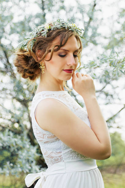 istock Beautiful young girl in olive trees. Wedding 652370402