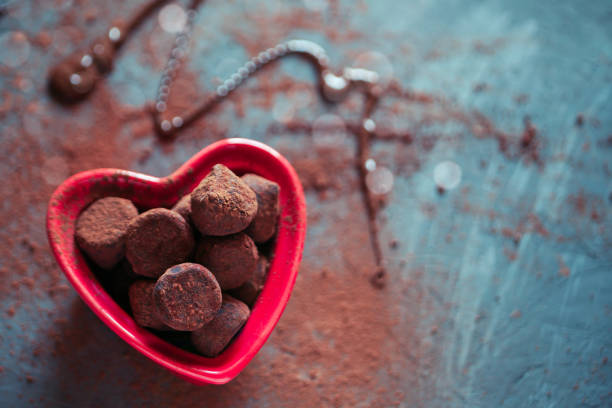 istock Chocolate truffles in a heart shaped bowl 652374634