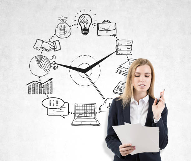 istock Woman with documents and business clock 652379636