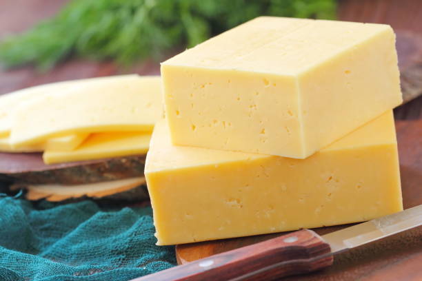 istock Piece of cheese on the table 652385164