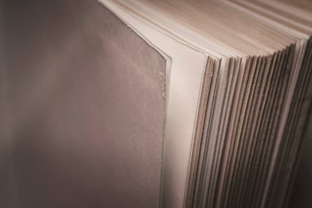 istock View of old book pages. Education and wisdom concept. 652385356