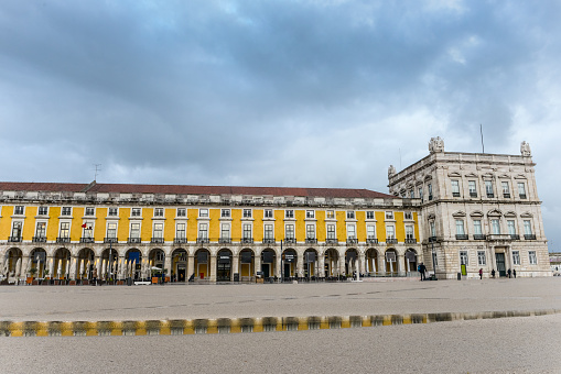 Lisboa, Portugal - March 31, 2016: View of Ribeira Palace, at Terreiro do Paço or Commerce Square. The square is one of the main tourist attractions of the Portuguese capital, situated near the Tagus river, the square is still commonly known as Terreiro do Paço (Palace Yard), because it was the location of the Paços da Ribeira (Royal Ribeira Palace) until it was destroyed by the great 1755 Lisbon earthquake.