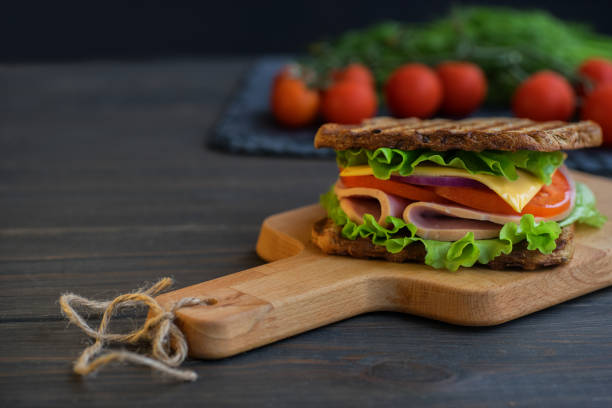 istock Sandwich bread tomato, lettuce and yellow cheese 652408842