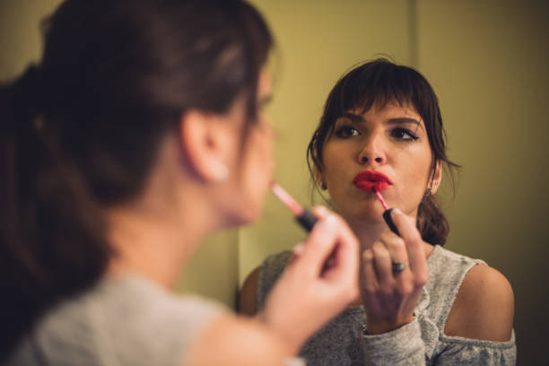 istock Woman applying make-up in toilette 652411538