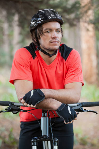 istock Male mountain biker with bicycle in the forest 652417982