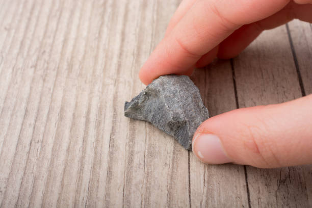 istock Hand holding little stone in hand 652422764