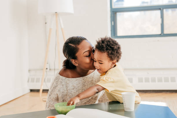 istock Mom kissing a toddler 652423126
