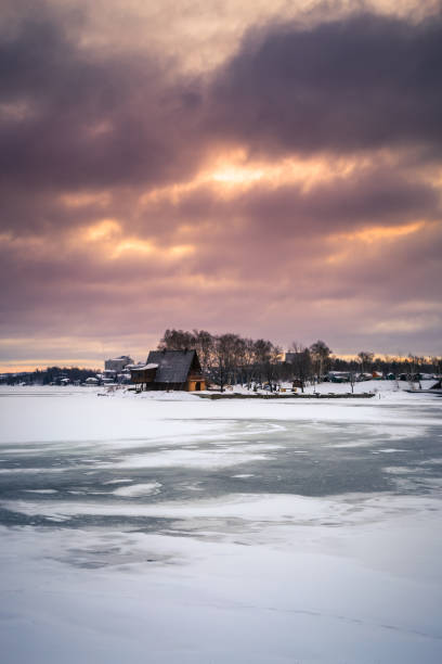 istock frozen lake during sunrise in winter season 652428534