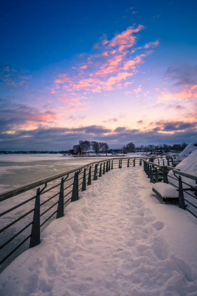 istock frozen lake during sunrise in winter season 652428630