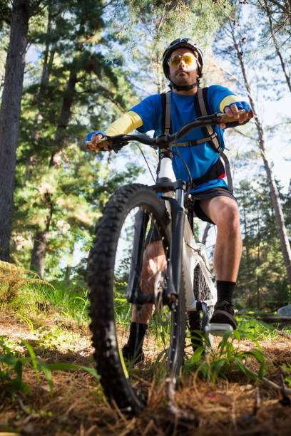 istock Male mountain biker with bicycle in the forest 652432196