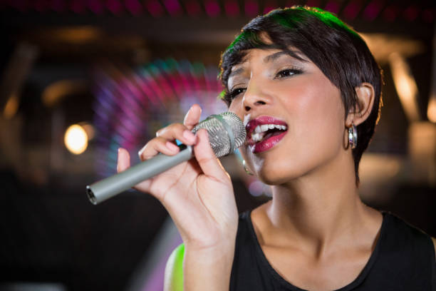 istock Woman singing in bar 652437468