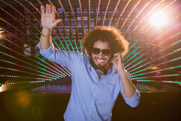istock Male DJ playing music 652437514