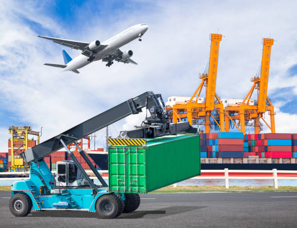 istock Cargo truck lifts container with plane for logistic import export 652452318