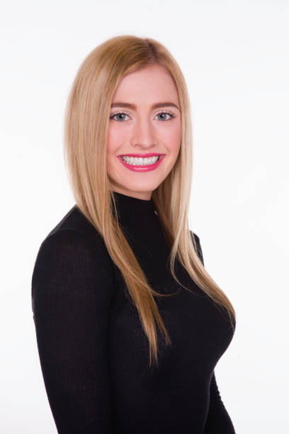 istock Smiling headshot of beautiful blond on white 652466058