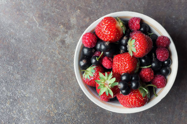 Strawberry, blackcurrant, raspberry. Top view. stock photo