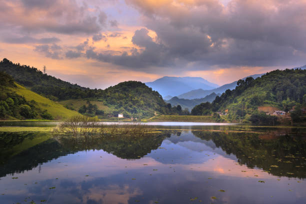 istock beautiful sunset on a deserted lake with cloudy skies fanciful 652506810