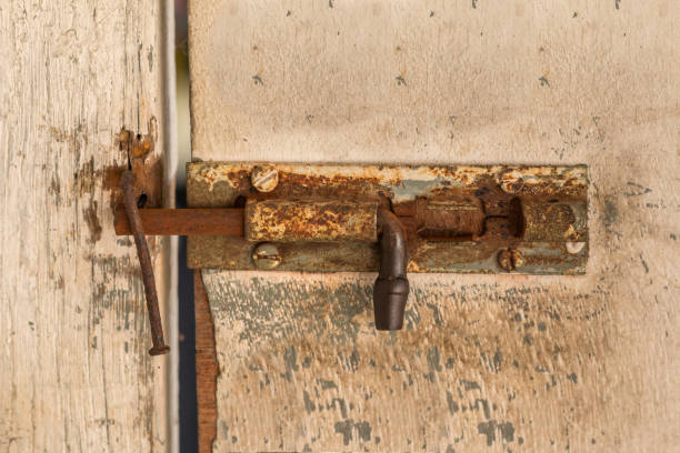 istock old wooden door with rusty lock 652509764