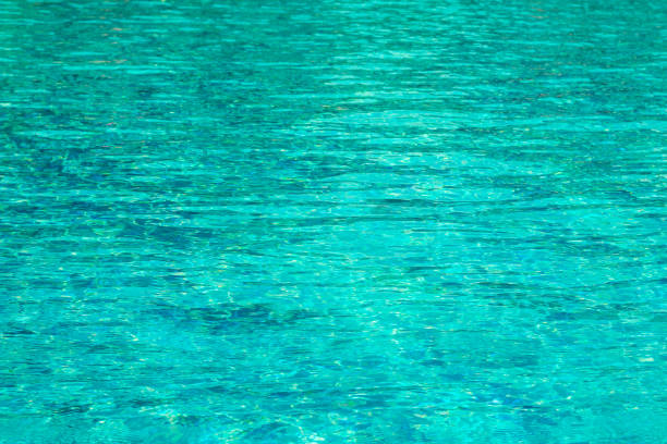 istock Surface water at swimming pool abstract background 652526454