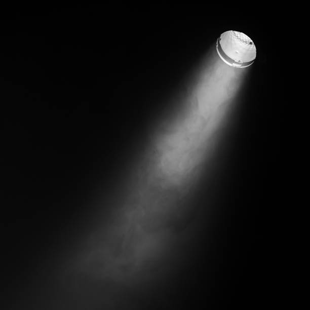 istock Ray of scenic spot light over black smoke 652542942