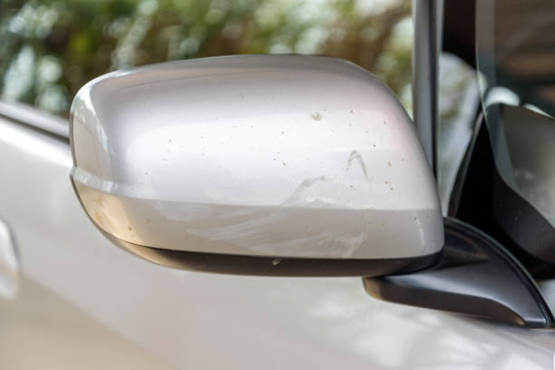 istock Car accident - Smashed wing mirror of silver car 652550784