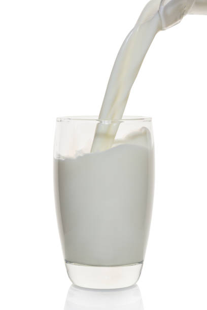 istock Milk is poured into a glass 652557024