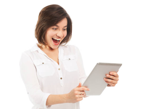 istock Happy woman on her electronic tablet 652557064