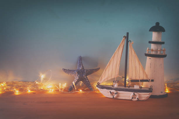 istock Nautical concept with sea life style objects on wooden table 652580330