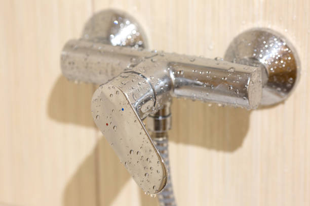 istock Wet Faucet in the bathroom 652583618