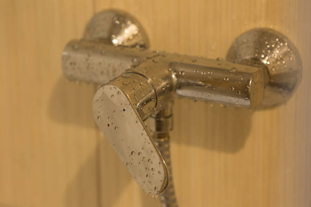 istock Wet Faucet in the bathroom 652583698