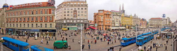 ZAGREB - OCTOBER 3: Unidentified people on main city square (Ban Jelacic square) on October 3, 2014 in Zagreb, Croatia. Many people, especially tourists visit Ban Jelacic square, which is located in old city core.
