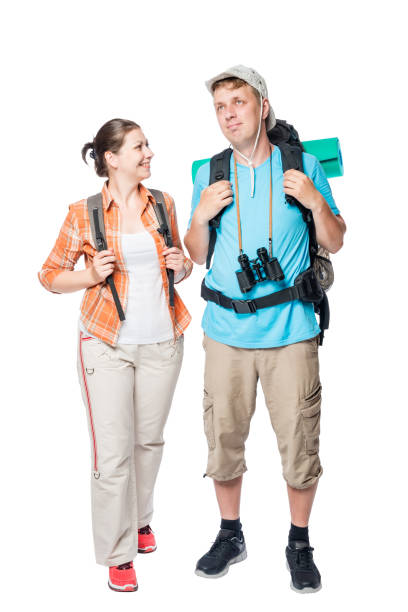 istock smiling travelers with backpacks on a white background 652587678