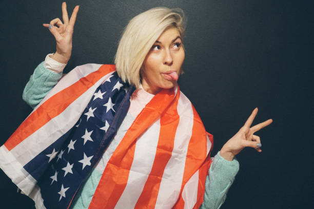 istock Blonde girl with USA flag 652609664