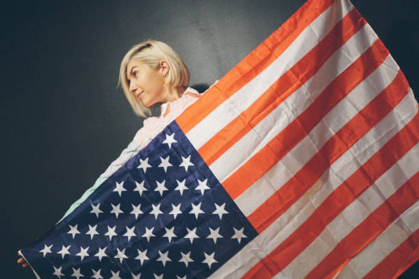 istock Blonde girl with USA flag 652609684