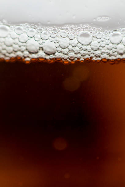 istock Blond beer drink close up with white foam bubbles 652613992