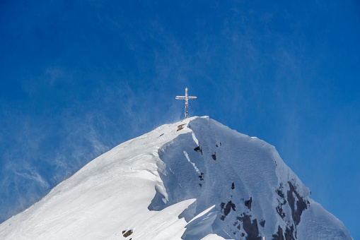 Top of the Hintertuxer Glacier (Tuxer Ferner) in Tyrol, Austria with the summit cross in 3250m height