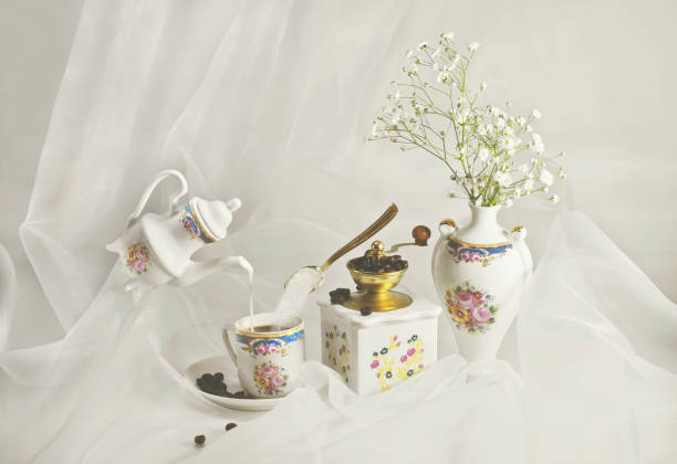 istock Cup of coffee with pouring milk and bulking sugar 652639568