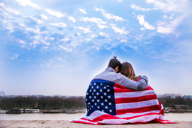 istock Couple Dates with American flag 652640630
