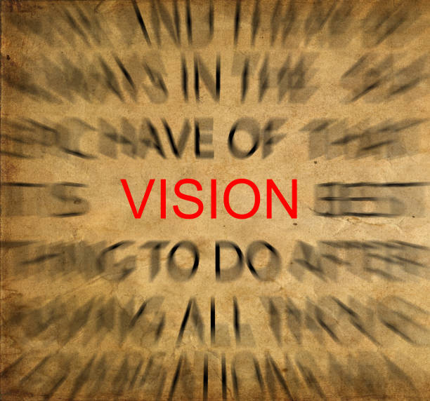 istock Blured text on vintage paper with focus on VISION 652664144
