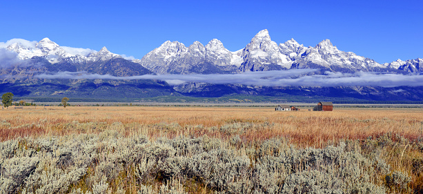 Grand Teton mountain range and Snake river in the Yellowstone Ecosystem of western USA, North America. The nearest cities are Jackson and Cody, Wyoming, Denver, Colorado, Salt Lake City, Utah, Bozeman and Billings, Montana.