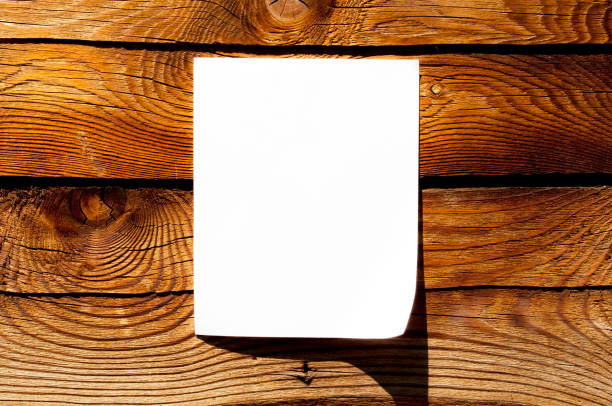 istock Blank paper on wooden background 652667042