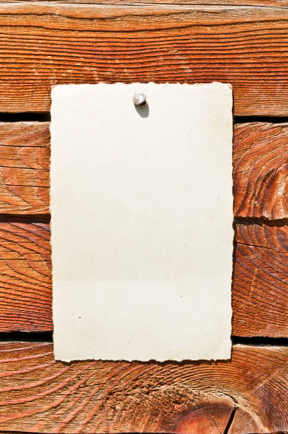 istock Note nailed on wooden background 652667060
