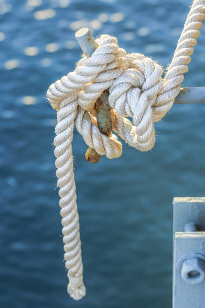 istock Rope and a jetty cleat with sunlight 652667830
