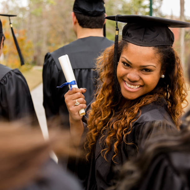 istock African descent college student at college graduation. 652671710